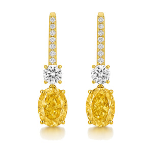 Solange earrings in 14K yellow gold with a fancy yellow oval-cut lab-grown diamond