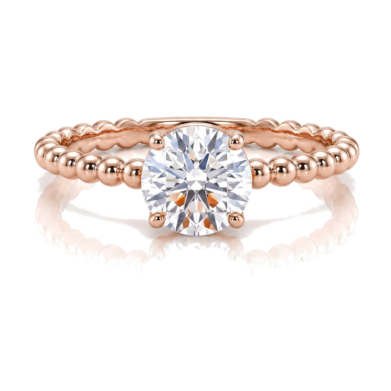 Delia ring in 14K rose gold with a round-cut lab-grown diamond