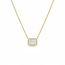 Rhea pendant in 14K yellow gold with an emerald-cut lab-grown diamond, full chain view