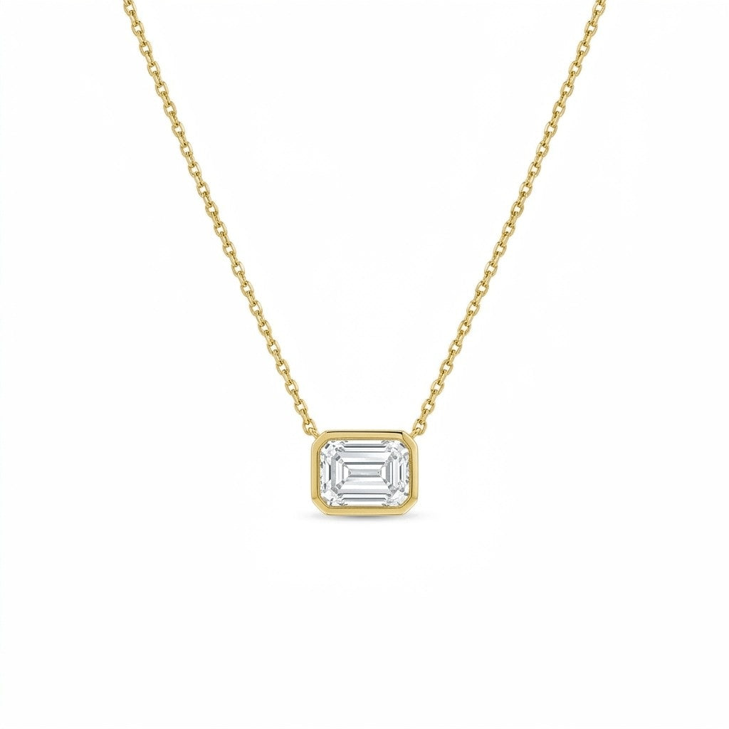 Rhea pendant in 14K yellow gold with an emerald-cut lab-grown diamond, full chain view