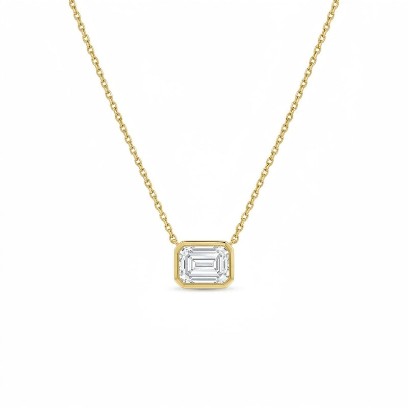 Rhea pendant in 14K yellow gold with an emerald-cut lab-grown diamond, full chain view