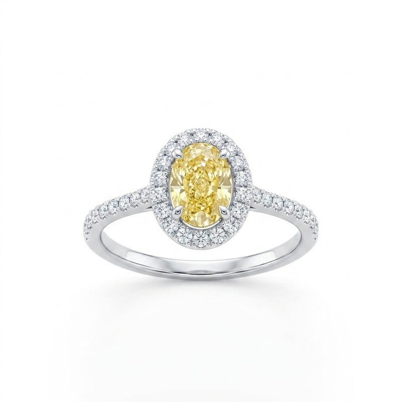 Aurelie ring in 14K white gold with a fancy yellow oval-cut lab-grown diamond