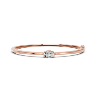 Sabrina bracelet in 14K rose gold with an oval-cut lab-grown diamond