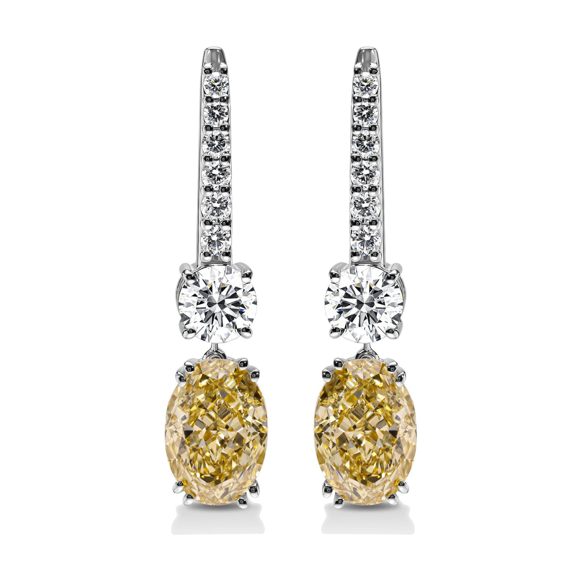 Solange earrings in 14K white gold with a fancy yellow oval-cut lab-grown diamond