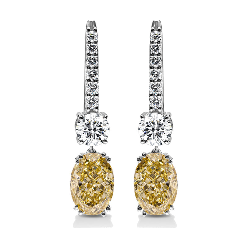 Solange earrings in 14K white gold with a fancy yellow oval-cut lab-grown diamond