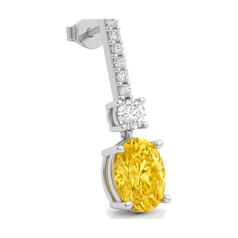 Solange earrings in 14K white gold with a fancy yellow oval-cut lab-grown diamond
