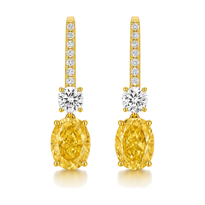 Solange earrings in 14K yellow gold with a fancy yellow oval-cut lab-grown diamond
