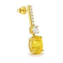 Solange earrings in 14K yellow gold with a fancy yellow oval-cut lab-grown diamond